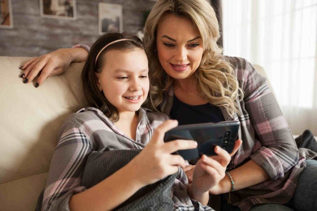 Mom and Daughter Looking at Phone